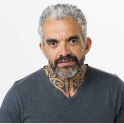 Head and shoulders pic of Jared Flitcroft, wearing a dark grey top in front of a white background.