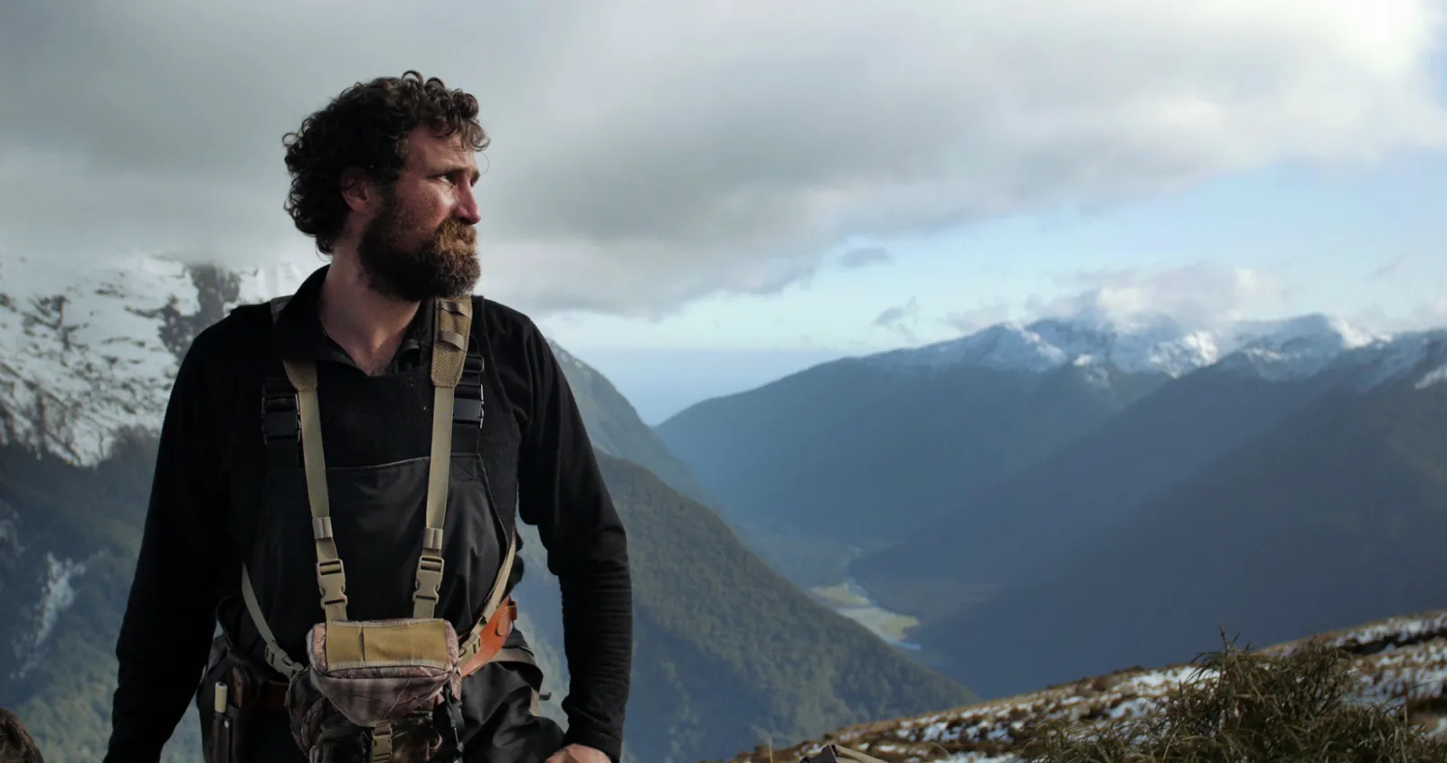 MEAT JOSH STILL01 Josh Looks Over Mountain