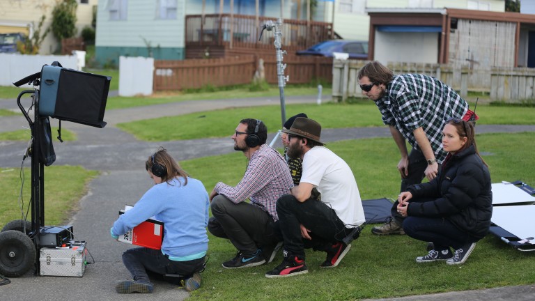 Young film crew on location