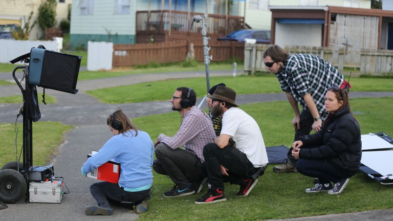 Young film crew on location