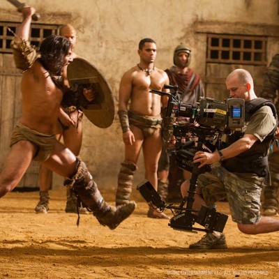 Manu Bennett lunges at Steadicam operator Cameron McLean