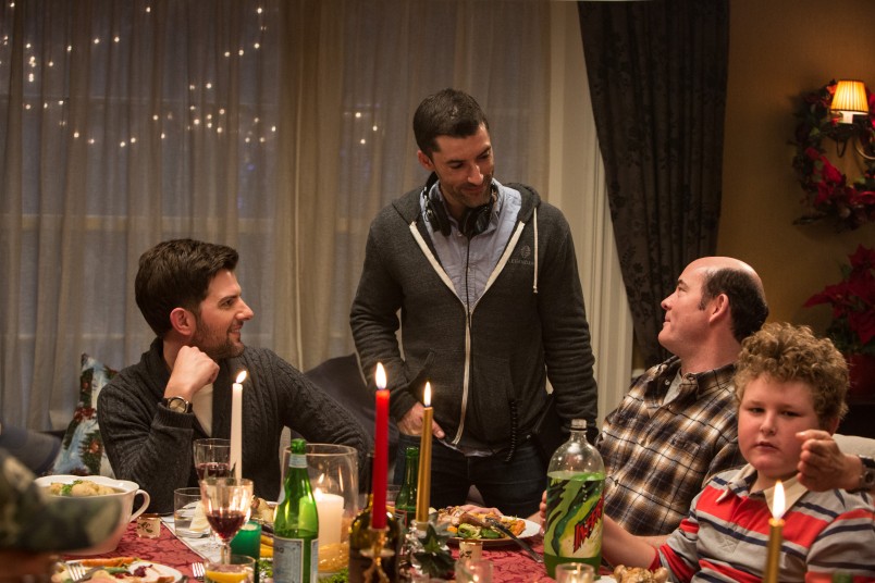 Producer Alex Garcia checks in with the cast. 